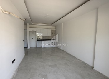 Апартаменты 1+1, 60м², с видом на горы в комфортабельной новостройке в центре Махмутлара, Алания ID-18146 фото-5