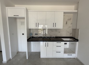 Апартаменты 1+1, 60м², с видом на горы в комфортабельной новостройке в центре Махмутлара, Алания ID-18146 фото-6