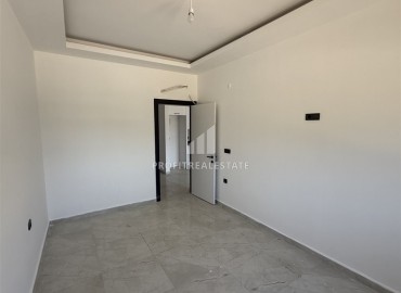 Апартаменты 1+1, 60м², с видом на горы в комфортабельной новостройке в центре Махмутлара, Алания ID-18146 фото-8