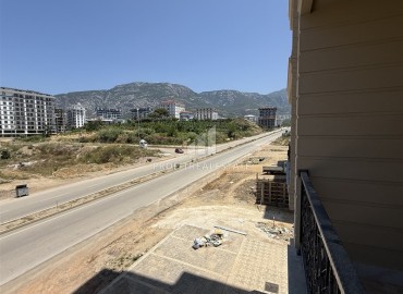 Апартаменты 1+1, 60м², с видом на горы в комфортабельной новостройке в центре Махмутлара, Алания ID-18146 фото-12