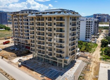 Апартаменты 1+1, 60м², с видом на горы в комфортабельной новостройке в центре Махмутлара, Алания ID-18146 фото-14