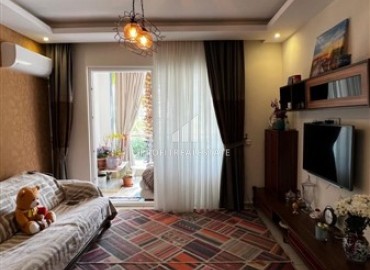 Уютные апартаменты 1+1, 65м², в резиденции с хорошей инфраструктурой в 450м от моря в Махмутларе, Алания ID-18151 фото-2