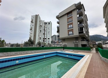 Квартира с одной спальней, 55м², в новостройке в Коньяалты, микрорайон Сарысу, Анталия ID-18152 фото-1