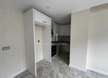 Квартира с одной спальней, 55м², в новостройке в Коньяалты, микрорайон Сарысу, Анталия ID-18152 фото-3