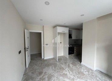 Квартира с одной спальней, 55м², в новостройке в Коньяалты, микрорайон Сарысу, Анталия ID-18152 фото-9