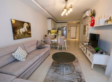 Квартира 1+1 с выходом в сад, 80м², с элегантным интерьером, на первой береговой линии в Кестеле, Алания ID-18155 фото-2