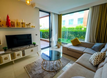 Квартира 1+1 с выходом в сад, 80м², с элегантным интерьером, на первой береговой линии в Кестеле, Алания ID-18155 фото-3