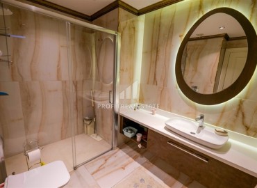 Квартира 1+1 с выходом в сад, 80м², с элегантным интерьером, на первой береговой линии в Кестеле, Алания ID-18155 фото-13