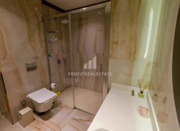 Квартира 1+1 с выходом в сад, 80м², с элегантным интерьером, на первой береговой линии в Кестеле, Алания ID-18155 фото-14