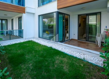 Квартира 1+1 с выходом в сад, 80м², с элегантным интерьером, на первой береговой линии в Кестеле, Алания ID-18155 фото-20