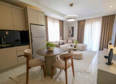 Новые двухкомнатные апартаменты, 60м², в новостройке премиум класса в районе Махмутлар, Алания ID-18156 фото-5