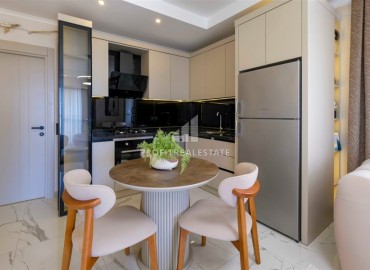 Новые двухкомнатные апартаменты, 60м², в новостройке премиум класса в районе Махмутлар, Алания ID-18156 фото-7