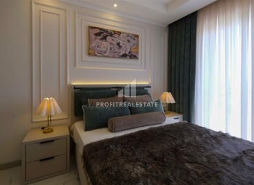 Новые двухкомнатные апартаменты, 60м², в новостройке премиум класса в районе Махмутлар, Алания ID-18156 фото-9