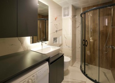 Новые двухкомнатные апартаменты, 60м², в новостройке премиум класса в районе Махмутлар, Алания ID-18156 фото-11