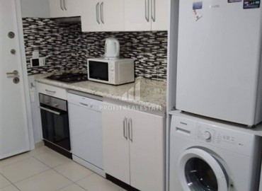 Готовая к проживанию, студия, 45м², в комплексе с инфраструктурой в 600м от моря в Махмутларе, Алания ID-18158 фото-5