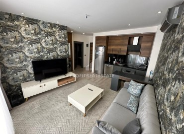 Уютная двухкомнатная квартира, 53м², на высоком этаже в элитном комплексе в 500м от моря в Махмутларе, Алания ID-18159 фото-3