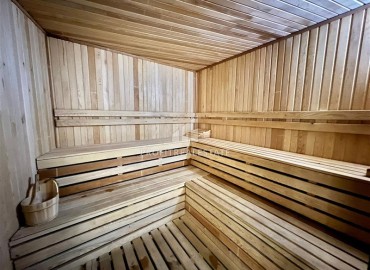 Уютная двухкомнатная квартира, 53м², на высоком этаже в элитном комплексе в 500м от моря в Махмутларе, Алания ID-18159 фото-18