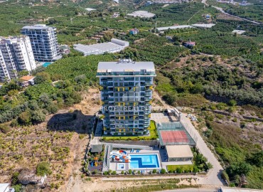 Элегантные двухкомнатные апартаменты, 50м² в комплексе с отельной инфраструктурой в Махмутларе, Алания ID-18134 фото-16