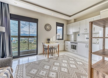 Новые видовые апартаменты 1+1, 55м², с дизайнерским интерьером в комплексе премиум класса в районе Махмутлар, Алания ID-18162 фото-3