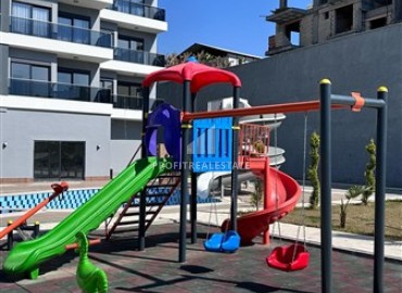 Новые видовые апартаменты 1+1, 55м², с дизайнерским интерьером в комплексе премиум класса в районе Махмутлар, Алания ID-18162 фото-18