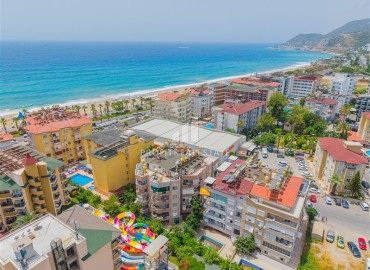 Просторная двухкомнатная квартира, 65м², с видом на море, в недорогом комплексе в центре Алании ID-18164 фото-1