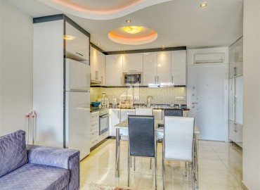 Элегантная квартира 1+1, 65м², на высоком этаже в элитном комплексе в 500м от моря в районе Махмутлар, Алания ID-18168 фото-9