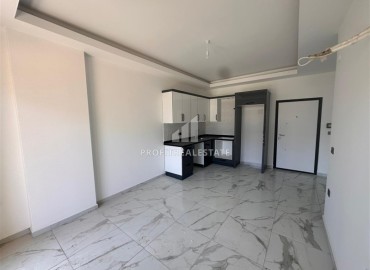 Квартира с одной спальней, 50м², в новом комплексе с бассейном в центре Махмутлара, Алания, по интересной цене ID-18172 фото-2