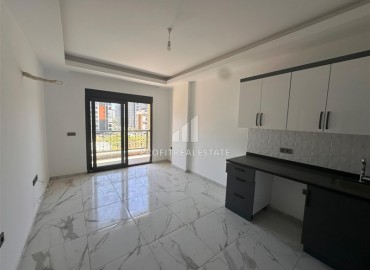 Квартира с одной спальней, 50м², в новом комплексе с бассейном в центре Махмутлара, Алания, по интересной цене ID-18172 фото-3