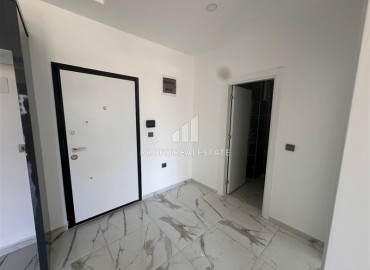 Квартира с одной спальней, 50м², в новом комплексе с бассейном в центре Махмутлара, Алания, по интересной цене ID-18172 фото-5