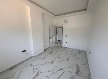Квартира с одной спальней, 50м², в новом комплексе с бассейном в центре Махмутлара, Алания, по интересной цене ID-18172 фото-6
