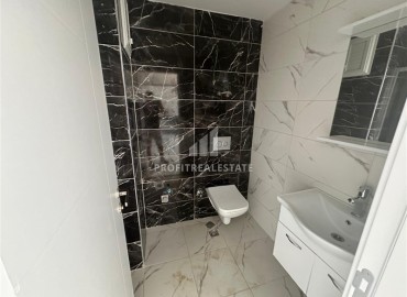 Квартира с одной спальней, 50м², в новом комплексе с бассейном в центре Махмутлара, Алания, по интересной цене ID-18172 фото-7