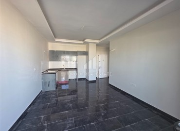 Комфортабельная двухкомнатная квартира, 60м², в комплексе с полной инфраструктурой, у моря в Махмутларе, Алания ID-18175 фото-2