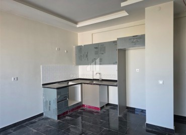 Комфортабельная двухкомнатная квартира, 60м², в комплексе с полной инфраструктурой, у моря в Махмутларе, Алания ID-18175 фото-4