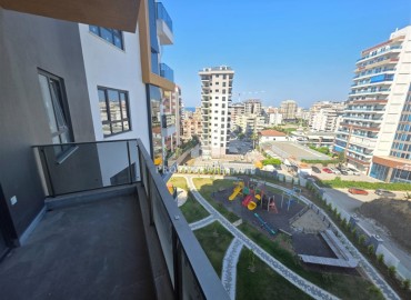 Комфортабельная двухкомнатная квартира, 60м², в комплексе с полной инфраструктурой, у моря в Махмутларе, Алания ID-18175 фото-13