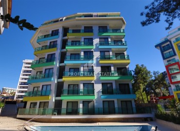 Современная двухкомнатная квартира, 50м² в комплексе с зимним бассейном в 900м от пляжа Инджекум в Авсалларе ID-18177 фото-1