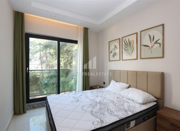 Современная двухкомнатная квартира, 50м² в комплексе с зимним бассейном в 900м от пляжа Инджекум в Авсалларе ID-18177 фото-6