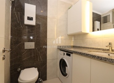 Современная двухкомнатная квартира, 50м² в комплексе с зимним бассейном в 900м от пляжа Инджекум в Авсалларе ID-18177 фото-10