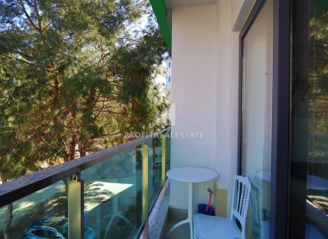 Современная двухкомнатная квартира, 50м² в комплексе с зимним бассейном в 900м от пляжа Инджекум в Авсалларе ID-18177 фото-12
