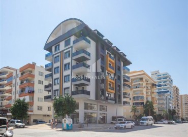 Меблированная квартира с одной спальней, 60м², в новом комплексе с отличным расположением в 200м от моря в Махмутларе, Алания ID-18178 фото-1