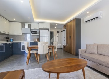 Меблированная квартира с одной спальней, 60м², в новом комплексе с отличным расположением в 200м от моря в Махмутларе, Алания ID-18178 фото-2