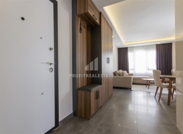 Меблированная квартира с одной спальней, 60м², в новом комплексе с отличным расположением в 200м от моря в Махмутларе, Алания ID-18178 фото-9