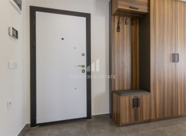 Меблированная квартира с одной спальней, 60м², в новом комплексе с отличным расположением в 200м от моря в Махмутларе, Алания ID-18178 фото-10