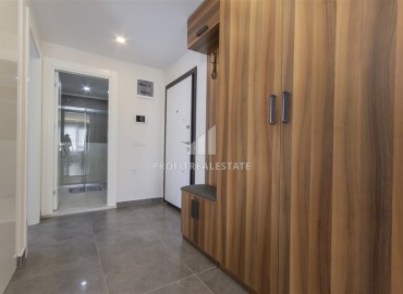 Меблированная квартира с одной спальней, 60м², в новом комплексе с отличным расположением в 200м от моря в Махмутларе, Алания ID-18178 фото-11