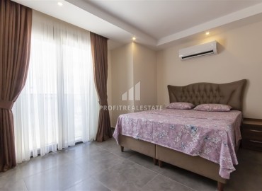 Меблированная квартира с одной спальней, 60м², в новом комплексе с отличным расположением в 200м от моря в Махмутларе, Алания ID-18178 фото-14