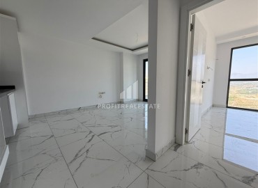 Квартира с одной спальней, 43,5м², с великолепным видом в новом элитном комплексе в Махмутларе, Аланья ID-18182 фото-4