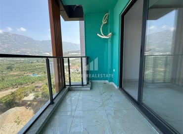 Квартира с одной спальней, 43,5м², с великолепным видом в новом элитном комплексе в Махмутларе, Аланья ID-18182 фото-11