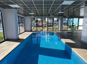 Квартира с одной спальней, 43,5м², с великолепным видом в новом элитном комплексе в Махмутларе, Аланья ID-18182 фото-20