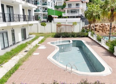 Новая квартира 1+1, 55м², с чистовой отделкой в комфортабельной новостройке у реки Дим Чай в Кестеле, Алания ID-18183 фото-16