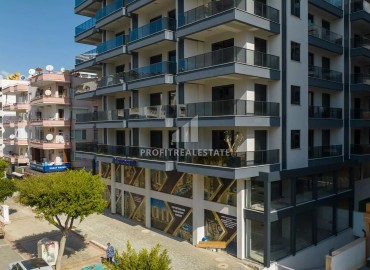 Квартира с одной спальней, 55м², в комплексе премиум класса в Махмутларе, в 200м от моря по привлекательной цене ID-18186 фото-1