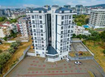 Двухкомнатная квартира, 62м², с чистовой отделкой в элитной новостройке в Авсалларе, Алания ID-18193 фото-10